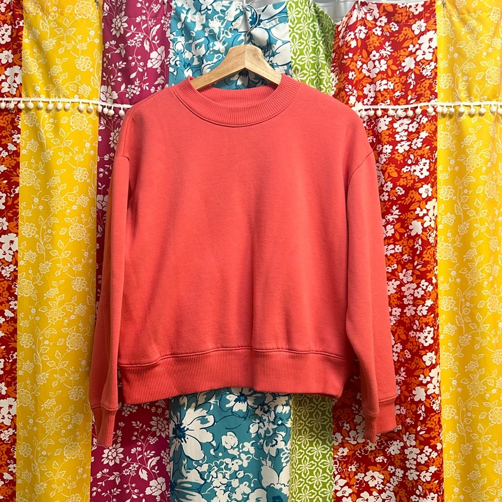 A New Day coral sweatshirt size medium. Good used condition.